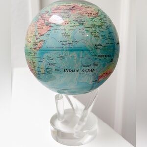 Colorful World Globe - rotates in sunlight